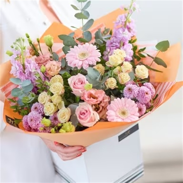 Luxurius pastel hand tied